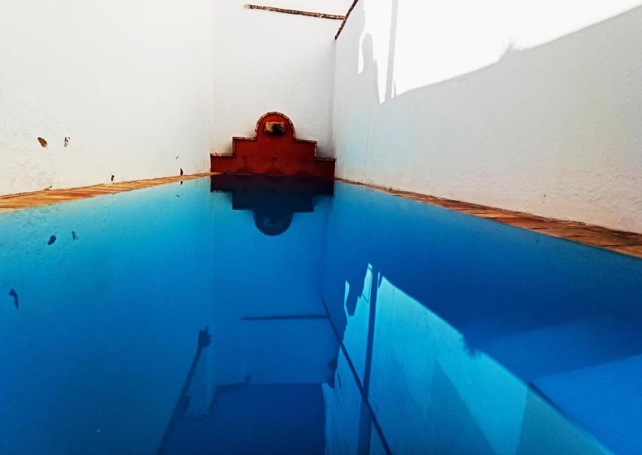 Frenteabastos Suites Cafe Hostal & Apartments カルモナ エクステリア 写真