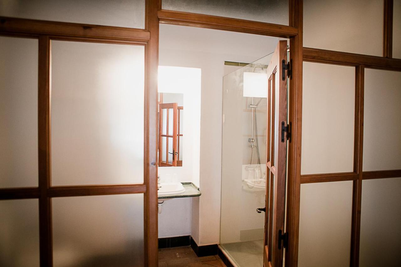 Frenteabastos Suites Cafe Hostal & Apartments カルモナ エクステリア 写真