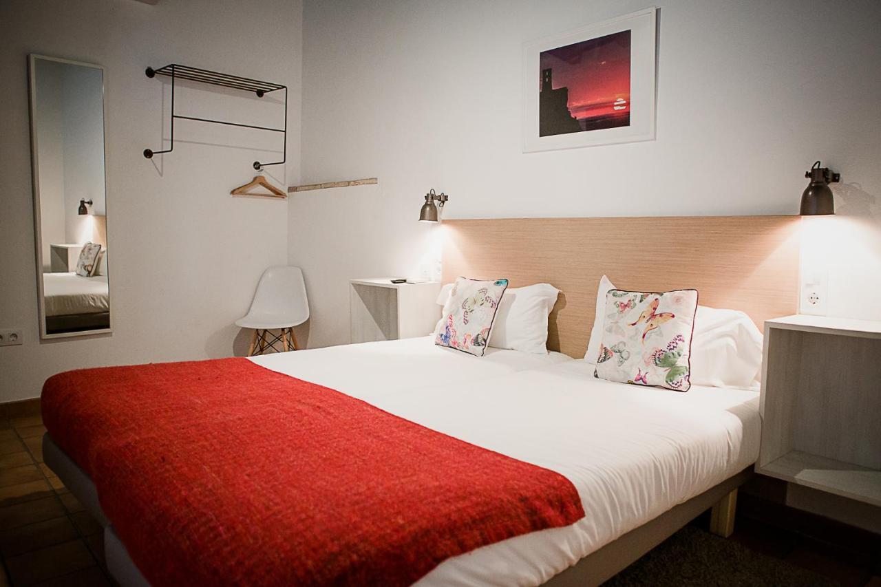 Frenteabastos Suites Cafe Hostal & Apartments カルモナ エクステリア 写真